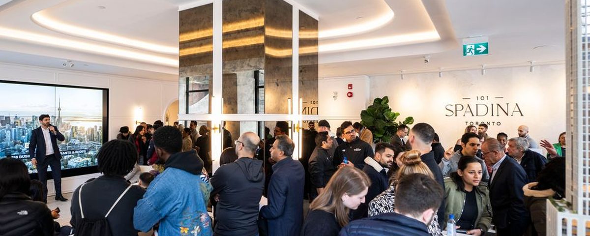 A packed presentation gallery on opening weekend at 101 Spadina